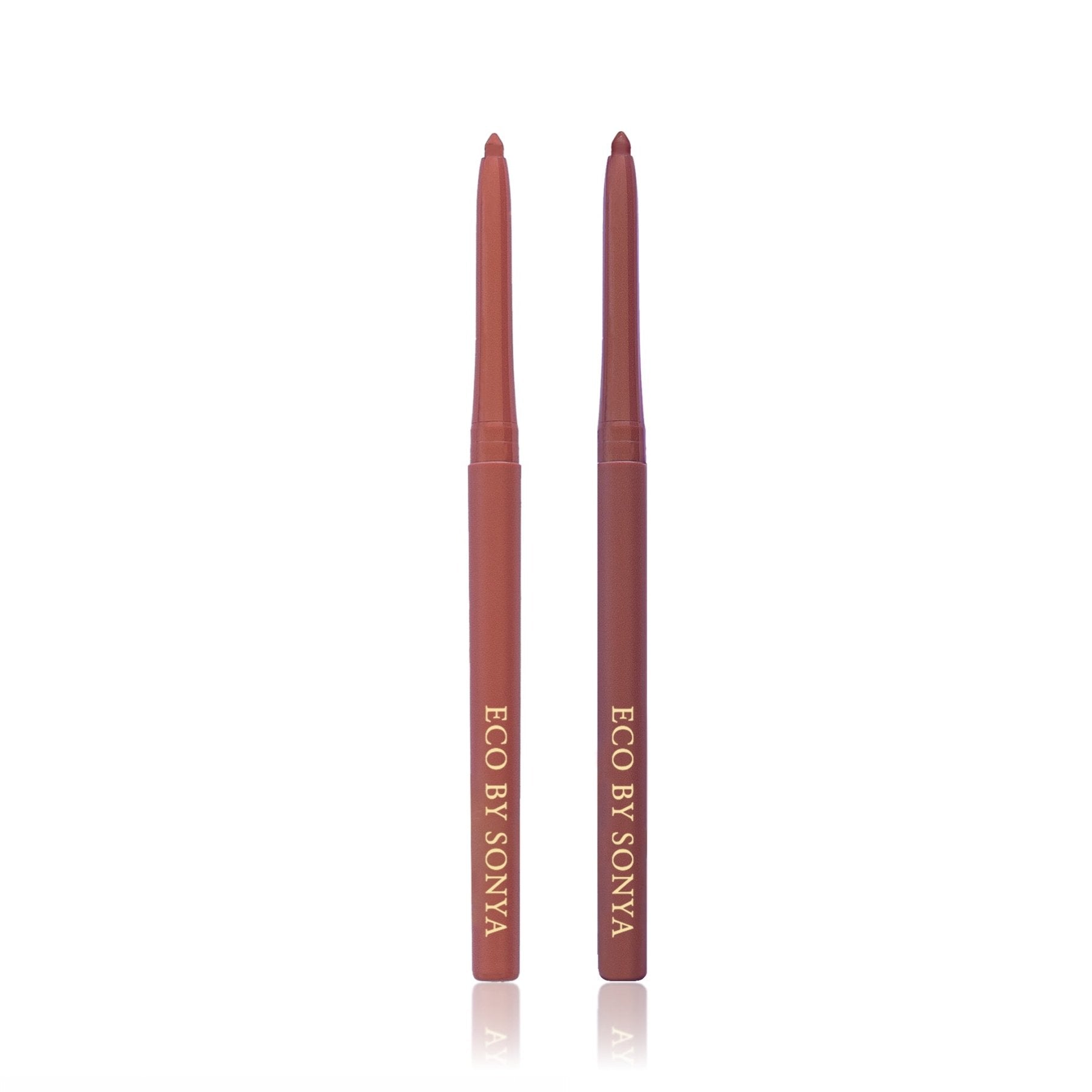 Two Eco By Sonya lip liners in the shades Moody Nude and Perfect Nude,  standing upright on a white background.